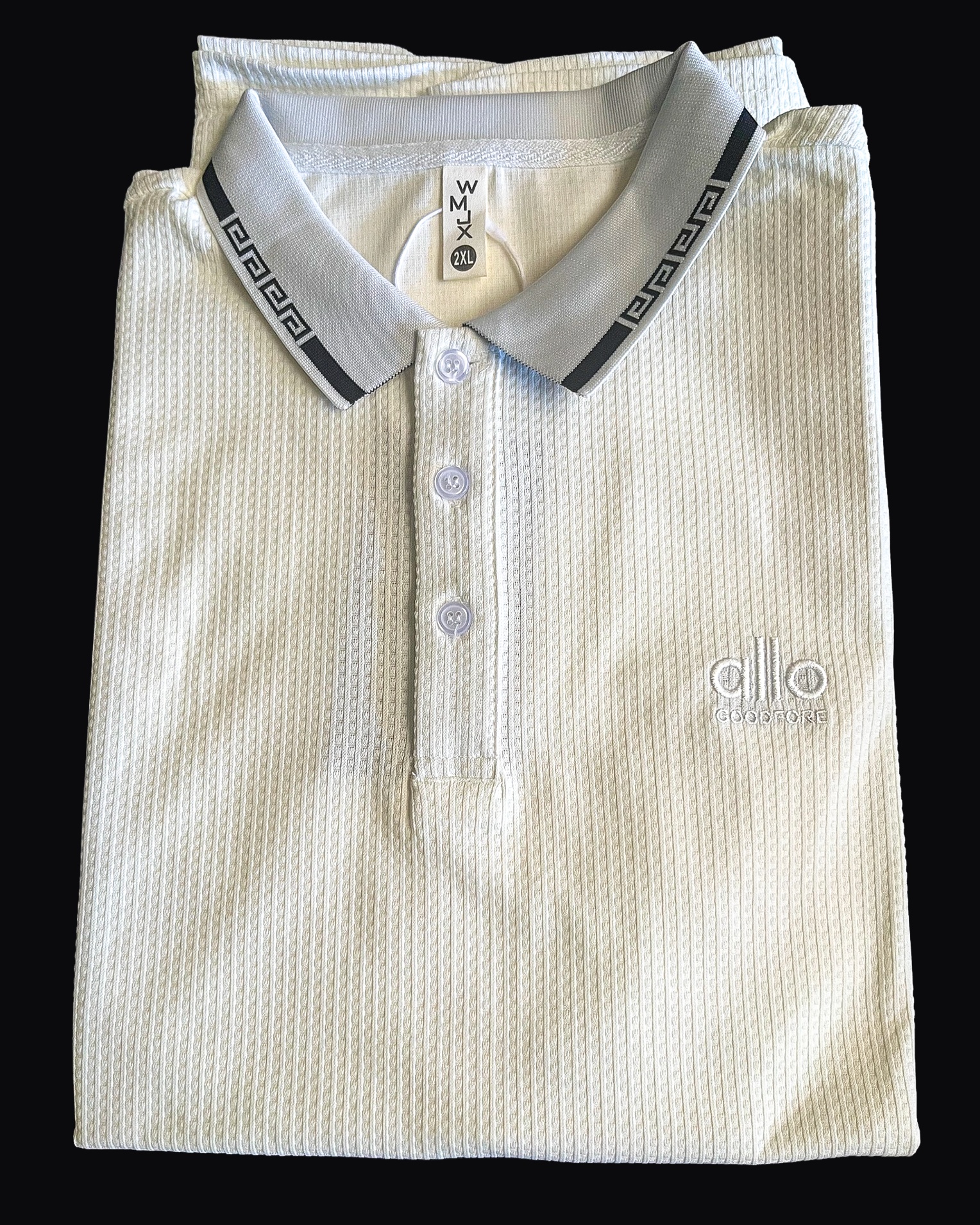 Polo blanc plié avec col à motif graphique noir